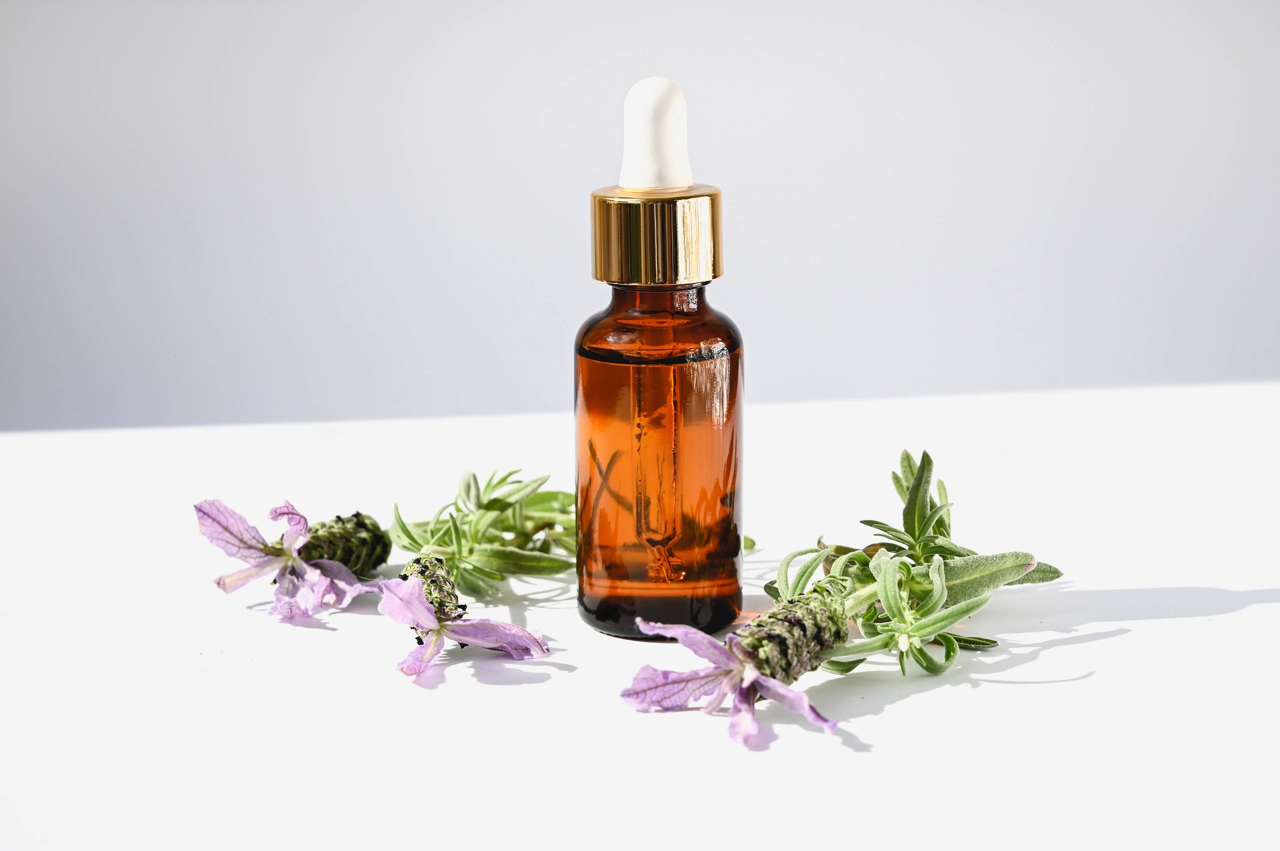 Amber perfume bottle with flowers